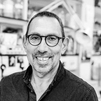 Sir Tony Kouzarides — Biography